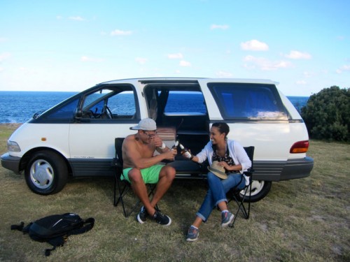 Toyota Tarago used campervan for sale - cheers and drinking some beers by the beach