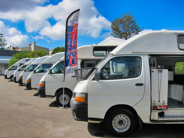 Toyota automatic campervan for sale - Photo of our yard where we sell and test drive a range of ex-hire Toyota campervans for sale